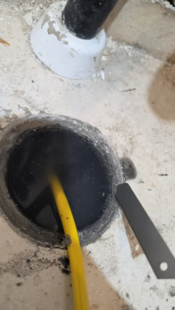 בדיקת פתח ניקוז באמצעות כבל
